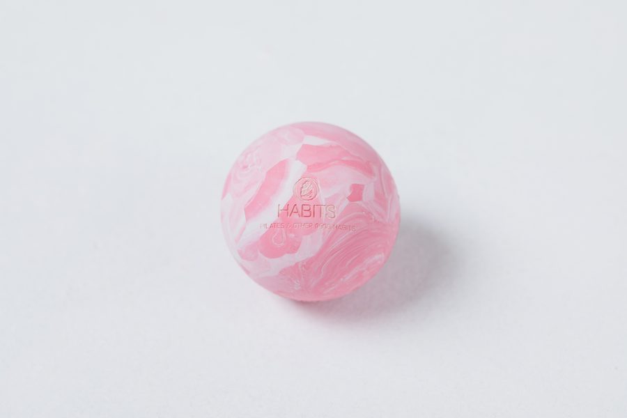 Fascia Release — pink myofascial release balls, embossed with the Other Good Habits mark